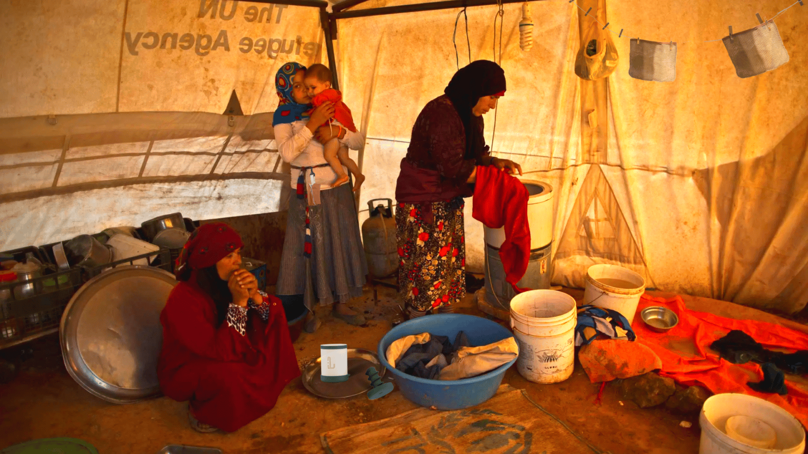 An in-context image, Lena in a refugee camp being used by a family